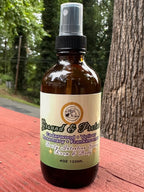 Ground + Protect Daily Intention Spray, 4 oz, on a wooden surface with a natural background