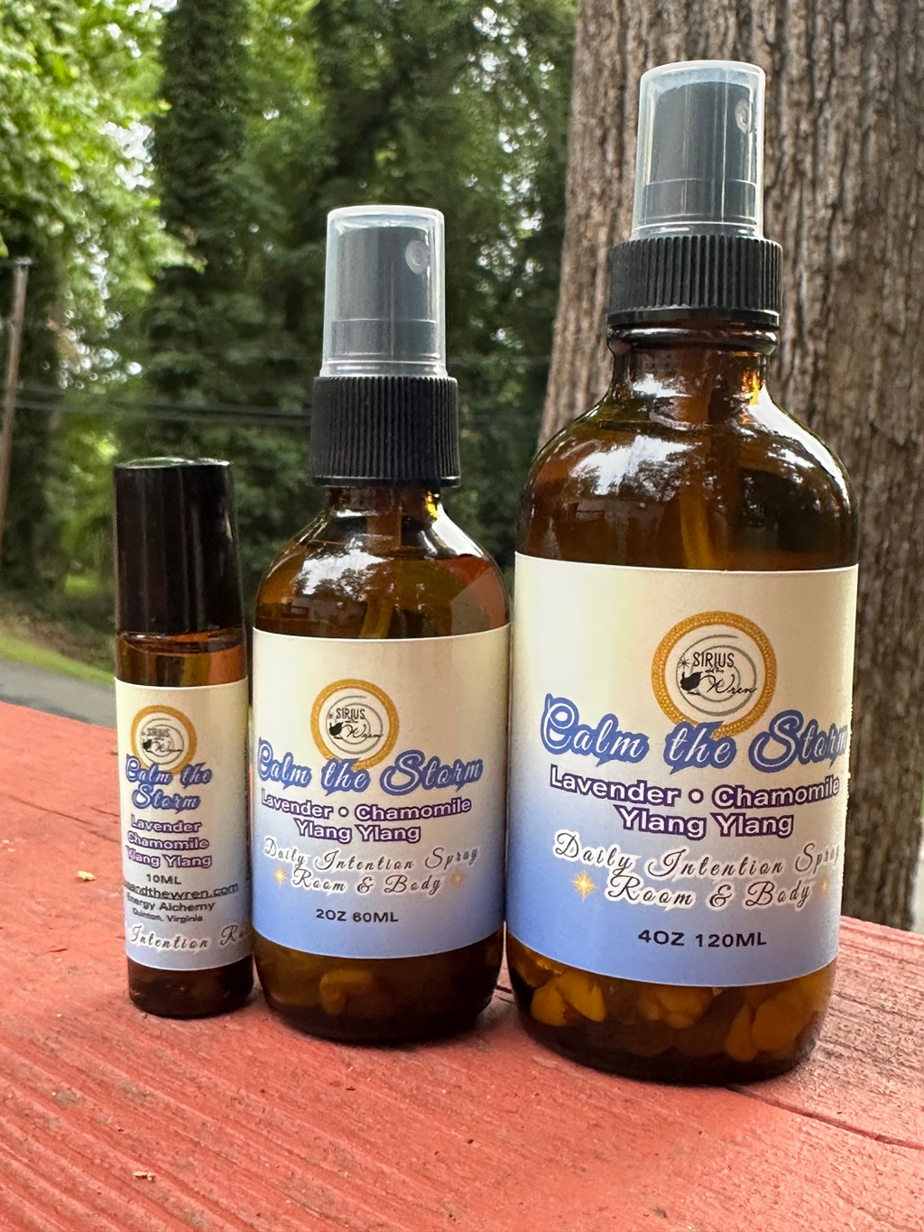Calm the Storm products together on a wooden surface with a natural background